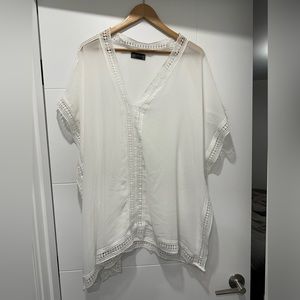 Light weight beach cover up. Never worn.